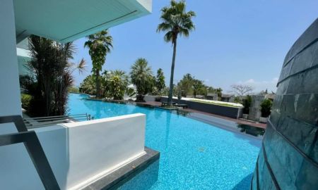 คอนโด - ขายและให้เช่า คอนโดหรู ติดหาดและเดินลงสระว่ายน้ำ Luxury Pool Access 2 Beds by Wong Amat Beach