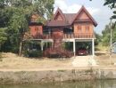 ขายบ้าน - ขายบ้านทรงไทยริมคลองเปรมประชากร พื้นไม้มะค่า 14-18 นิ้ว ยาว 6 เมตร 3 หลัง ราคาถูกมาก
