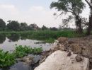 ขายที่ดิน - land that has been filled Next to the Tha Chin river70 meters beside the long canal3Entire along the land