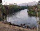 ขายที่ดิน - ขายที่ดินวิวสวยมองเห็นแม่น้ำสองมุม เหมาะสำหรับทำรีสอร์ทหรือบ้านพัก ตากอากาศ อำเภอไทรโยค กาญจนบุรี