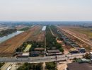 ขายที่ดิน - ขายที่ดินติดถนน 2 ฝั่ง ใกล้สนามบินสุวรรณภูมิ นิคมเวลล์โกรว์ 50 ไร่ ทำเลทอง พร้อมพัฒนาได้ทันที