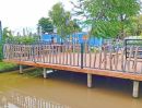 - วัดพระธรรมกาย 1กม. ญาคนรุม 2.5กม. บนที่ดิน 3 ไร่ ให้เช่าโกดัง 3ไร่ 400ตร.ม. รีสอร์ท 7นอน บ่อเลี้ยงปลา บ่อเลี้ยงกุ้ง ใกล้ตลาดไท 900 ม.
