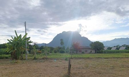 ขายที่ดิน - ขายที่ดินเปล่าขนาด 1 ไร่ 1 งาน 35 ตารางวา อ.เชียงดาว จ.เชียงใหม่ บรรยากาศร่มรื่น เห็นวิวดอยหลวง ใกล้โรงเรียนยูเมะมิกิ