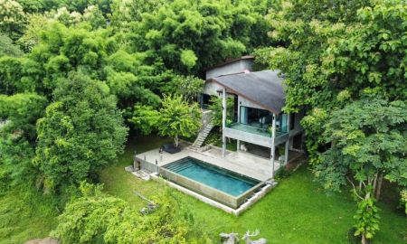 บ้าน - ค้นหาบ้านในฝันของคุณ ท่ามกลางบรรยากาศอันร่มรื่นของอำเภอแม่ริม จังหวัดเชียงใหม่ พูลวิลล่าสไตล์โมเดิร์นทรอปิคอลที่ผสมผสานความหรูหรากับธรรมชาติอย่างลงตัว