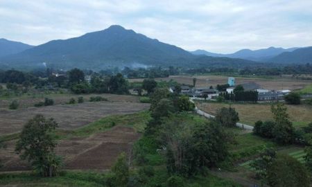 ขายที่ดิน - ขายที่ดินแปลงสวยติดถนนคอนกรีตสองเลน การเดินทางสะดวกสบาย อยู่ในชุมชน ใกล้โรงพยาบาลแม่ออน อำเภอแม่ออน จังหวัดเชียงใหม่ แวดล้อมไปด้วยภูเขาสวยงาม