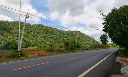 ขายที่ดิน - ขายที่ดินเปล่า หลังพิงเขา หน้ากว้างติดถนนทางหลวง 368 เมตร
