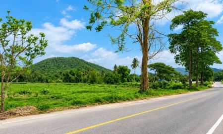 ขายที่ดิน - ขายที่ดิน 6 ไร่ 2 งาน 77 ตร.ว. ติดถนนใหญ่ แปลงมุม วิวภูเขา ติดคลองธรรมชาติ ทำเลดี